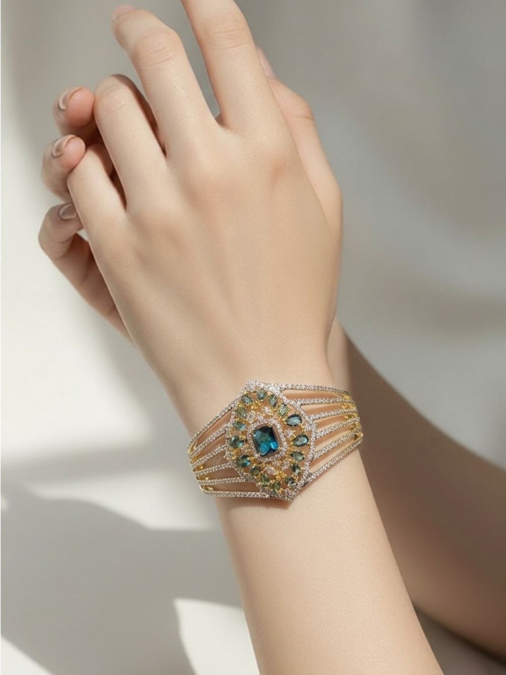 Elegant Gold-Tone Bracelet with Blue and Blue Gemstones